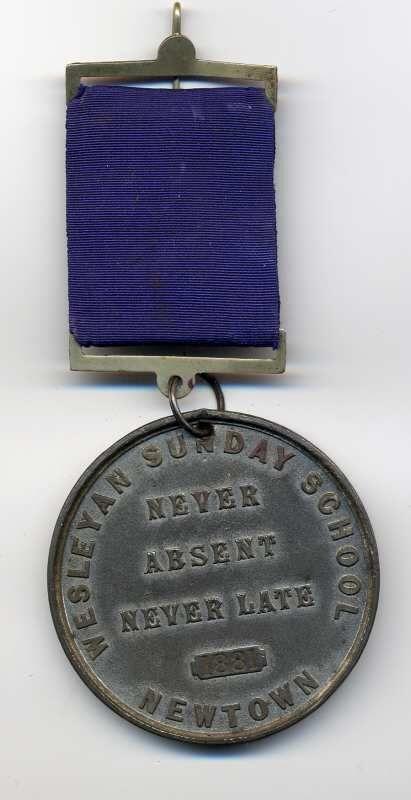 Rear of Wesleyan Sunday School medal. Rear of Wesleyan Sunday School medal.