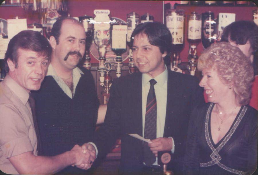 A cheque for £700 was handed to Dr. Nacquie for his 'Heartbeat' charity, 1982/3. A cheque for £700 was handed to Dr. Nacquie for his 'Heartbeat' charity, 1982/3.