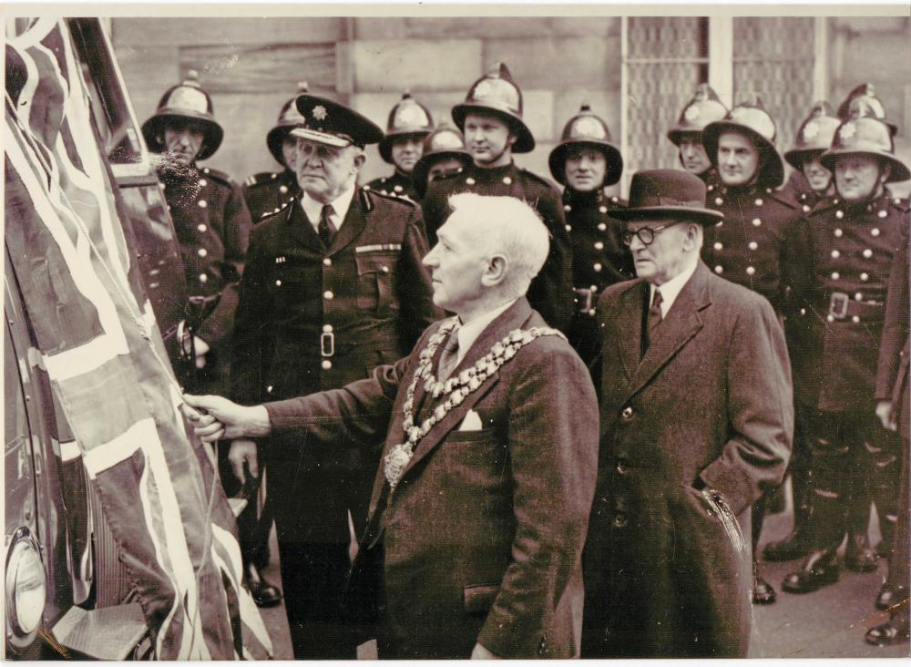 1957 My grandfather Oliver Somers unveiling a fire engine with his name