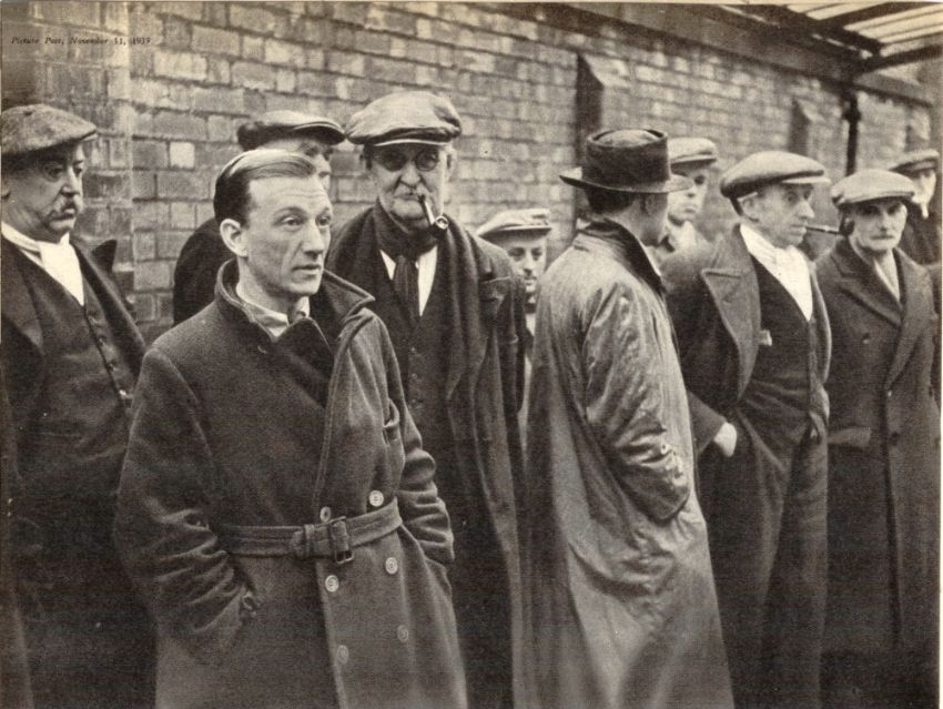 Wiganers standing outside a Labour Exchange