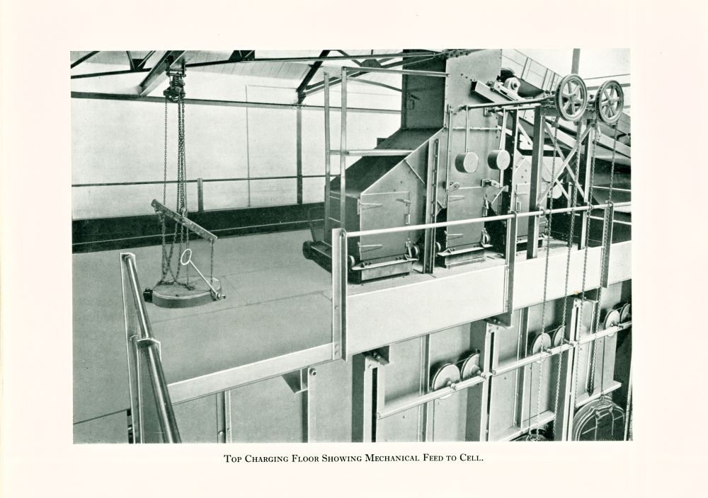 Top charging floor showing mechanical feed to cell