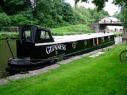 Guinness narrow boat moored at Crooke