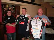 Presenting shirts to the riders