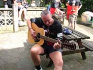 Paul strumming away in the beer garden