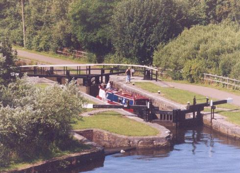 Through the locks on the Leeds Liverpool Canal Through the locks on the Leeds Liverpool Canal