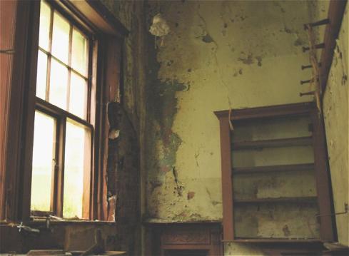 Small room with bare walls and damp Small room with bare walls and damp