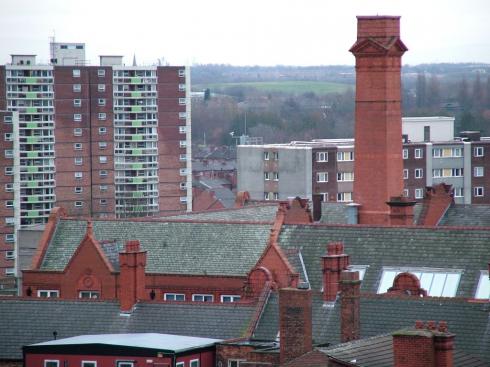 Flats at Scholes and chimney on Wigan Town Hall Flats at Scholes and chimney on Wigan Town Hall