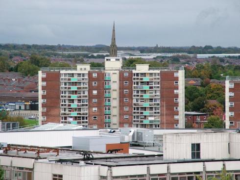 St. Catharine's spire beyond the flats in Scholes St. Catharine's spire beyond the flats in Scholes