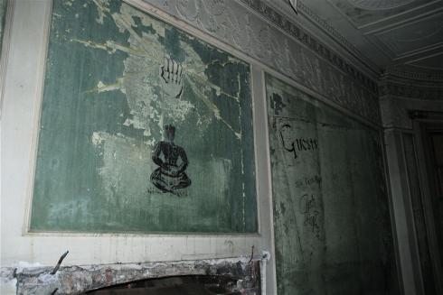 Ornate interior with signs of vandalism