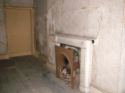 Old fireplace in need of renovation Old fireplace in need of renovation