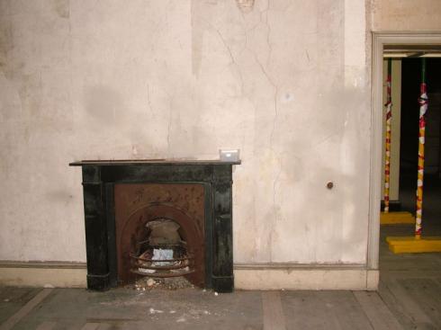 Old fireplace, note props in background Old fireplace, note props in background