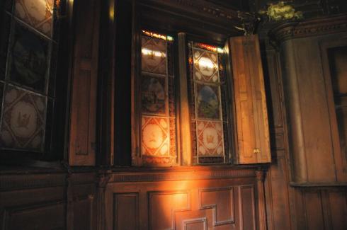 Old wooden panels and stained glass windows