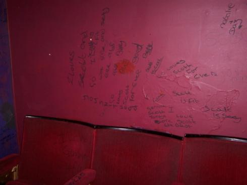 Graffiti on the back row of the cinema