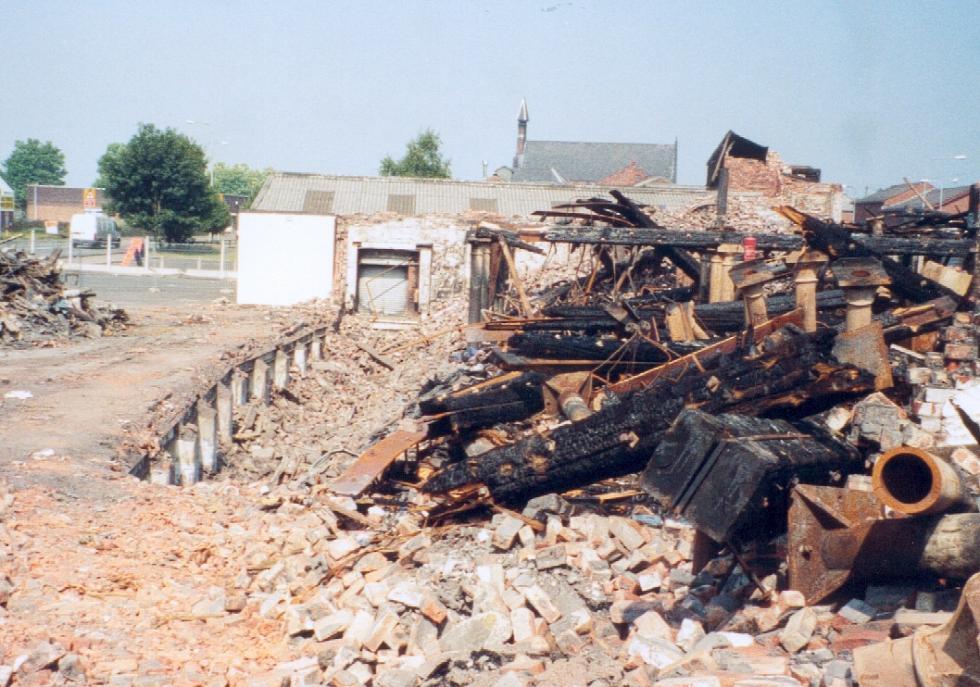 Charred oak beams and cast iron pillars