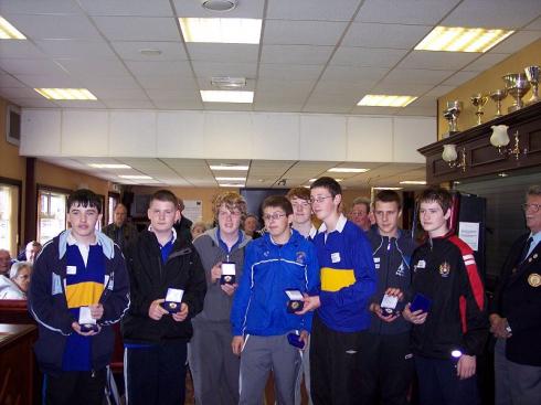 Receiving medals in the clubhouse Receiving medals in the clubhouse