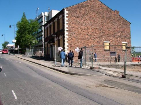 Looking up Millgate, Penningtons on right