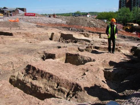 Lead archaeologist Ian Miller explains the trenches